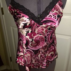 Blouse that has spaghetti straps and tie back